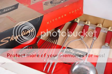 set of red vintage skyline utensils