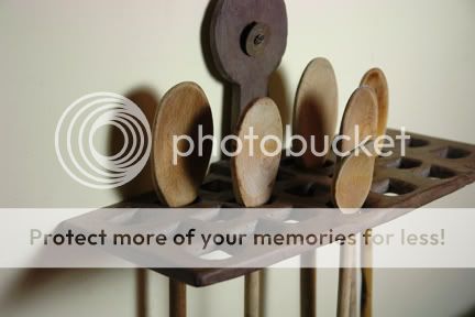 antique wooden spoon holder