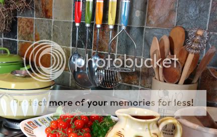 set of vintage multi-coloured kitchen utensils